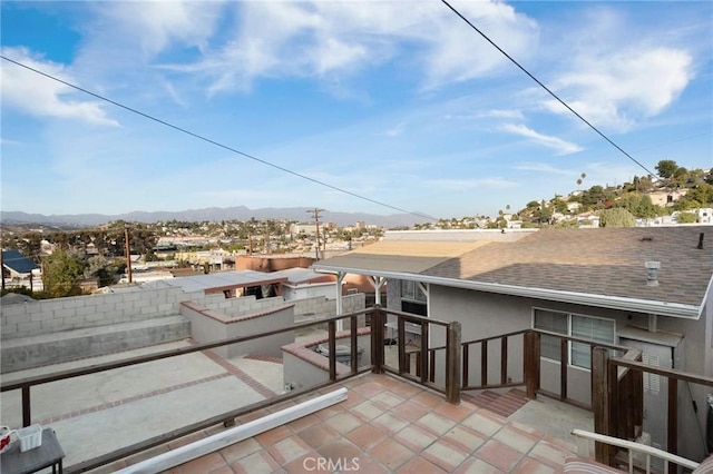 view of patio / terrace with a mountain view