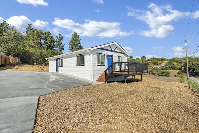 view of front of house with a deck