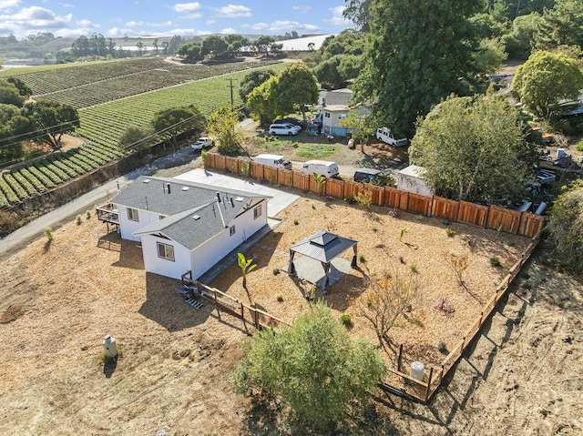 birds eye view of property featuring a rural view