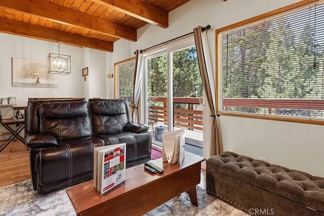 43869 Mendocino Dr, Big Bear Lake, CA 92315 - living area featuring wood ceiling with exposed beams, a chandelier, and wood finished floors