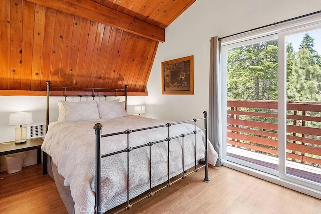 bedroom with access to exterior, lofted ceiling with beams, light wood-type flooring, and wood ceiling