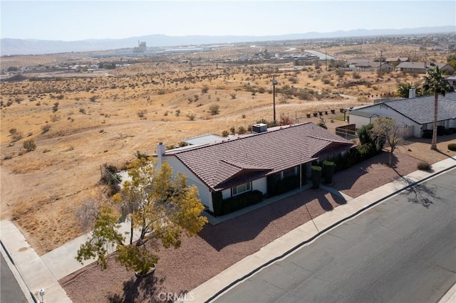 bird's eye view featuring a mountain view