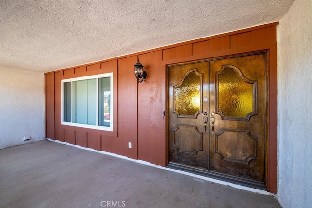 doorway to property featuring a porch