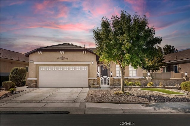 view of front of property featuring a garage