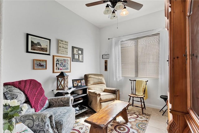 living area featuring light tile patterned flooring and ceiling fan