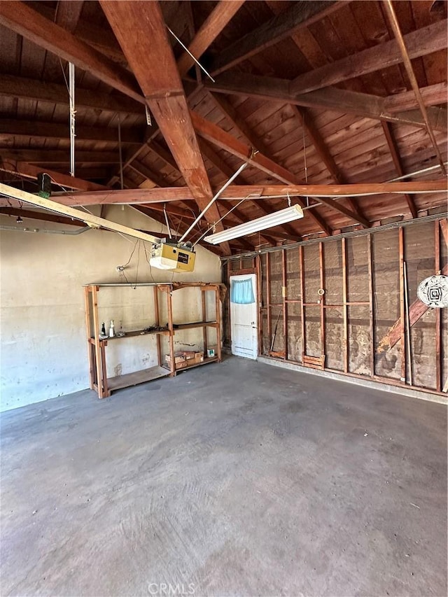 garage featuring a garage door opener