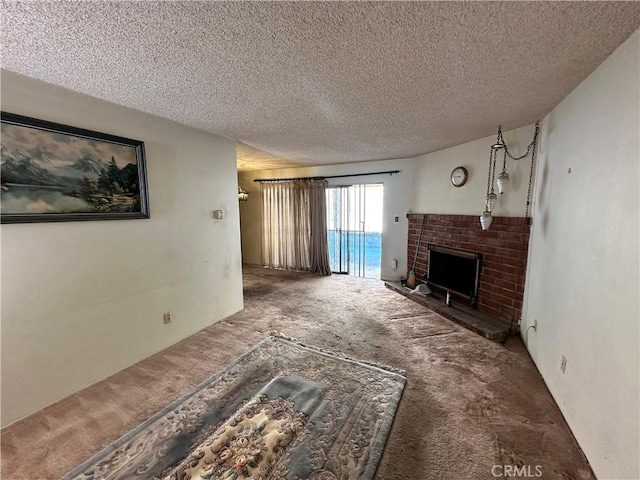 living room featuring carpet flooring, a textured ceiling, and a brick fireplace