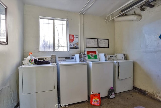 laundry area with washing machine and dryer