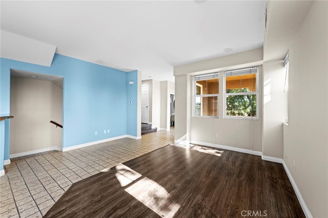 empty room featuring hardwood / wood-style floors