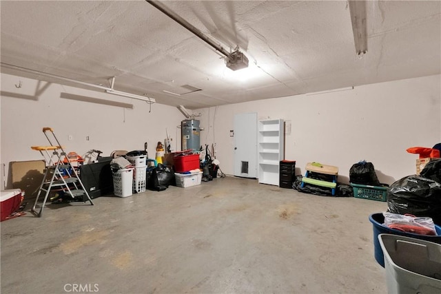 garage with strapped water heater