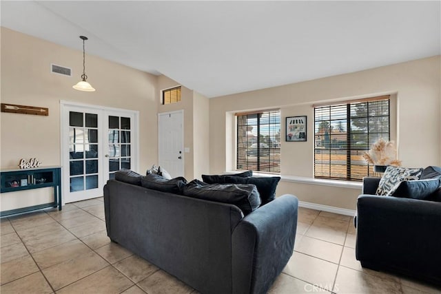 tiled living room with french doors