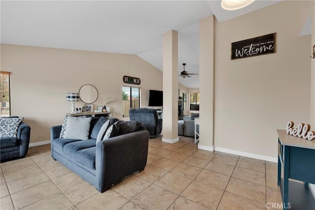 tiled living room featuring ceiling fan and lofted ceiling