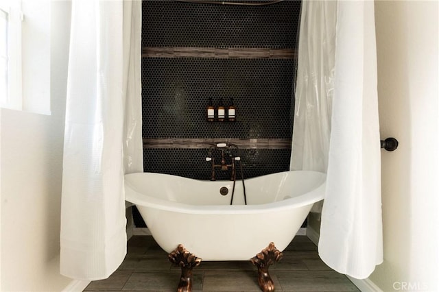 28164 N Bay Rd, Lake Arrowhead, CA 92352 - bathroom featuring a freestanding bath and baseboards
