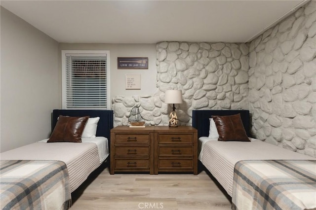 bedroom featuring light hardwood / wood-style floors