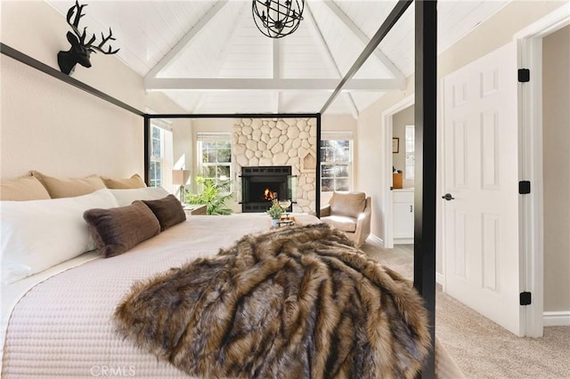 bedroom featuring a fireplace, carpet floors, high vaulted ceiling, and beamed ceiling