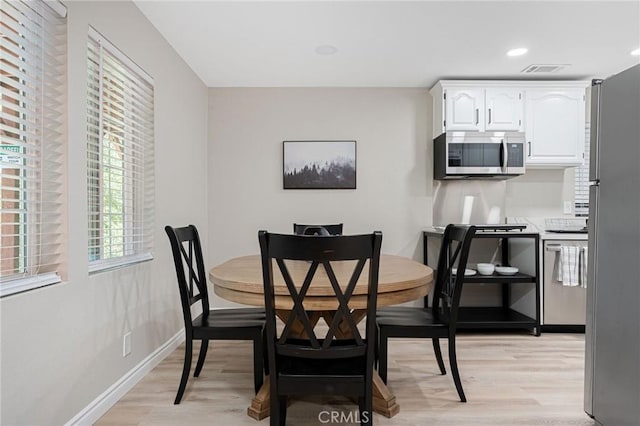 28164 N Bay Rd, Lake Arrowhead, CA 92352 - dining room with light wood-style floors and recessed lighting