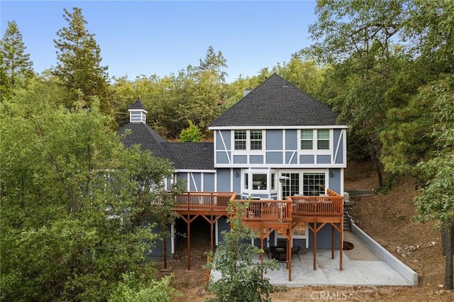 28164 N Bay Rd, Lake Arrowhead, CA 92352 - back of house featuring roof with shingles, a patio area, and a wooden deck