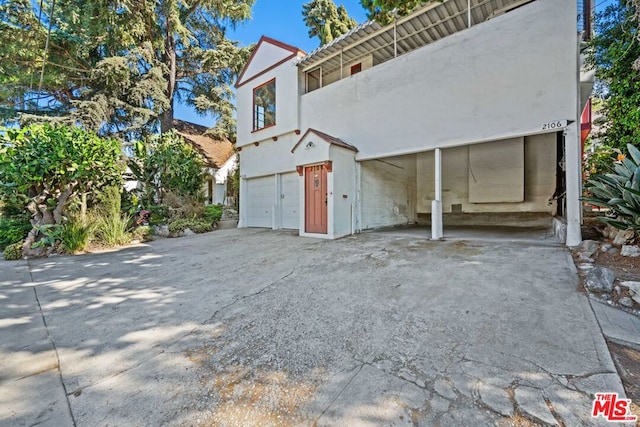 view of home's exterior with a garage