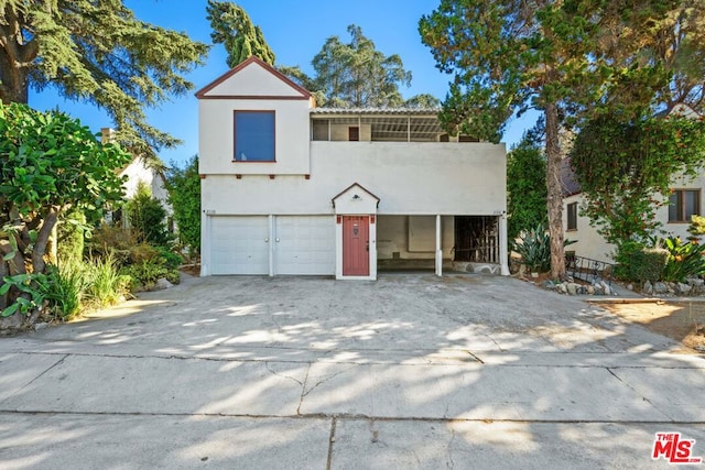 view of front of property featuring a garage