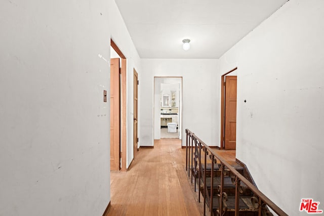 corridor featuring light wood-type flooring