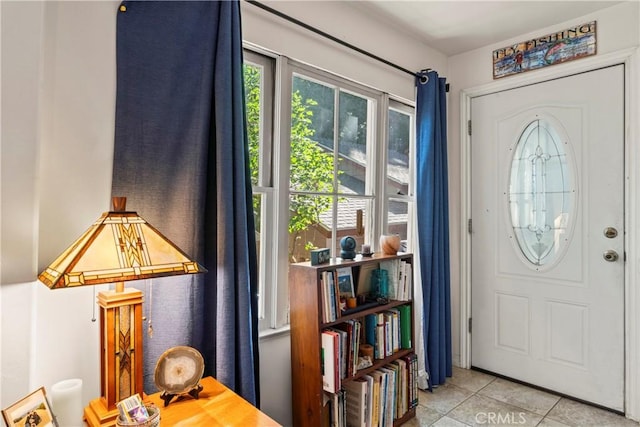 entryway featuring light tile patterned floors