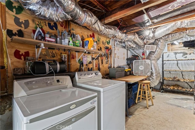 laundry room with independent washer and dryer