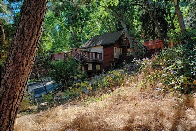 view of yard featuring a deck