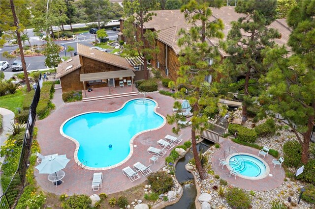 view of swimming pool with a patio area