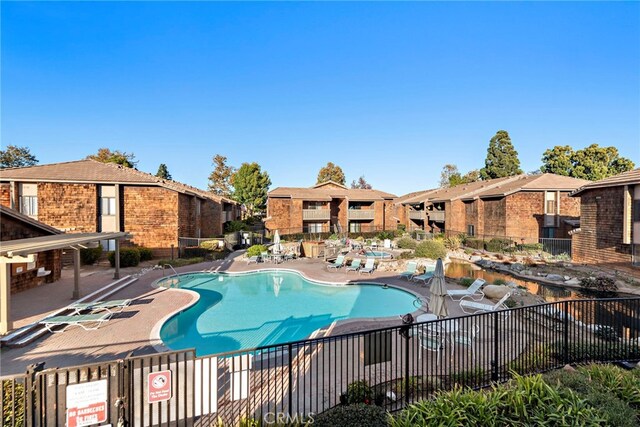 view of pool with a patio area