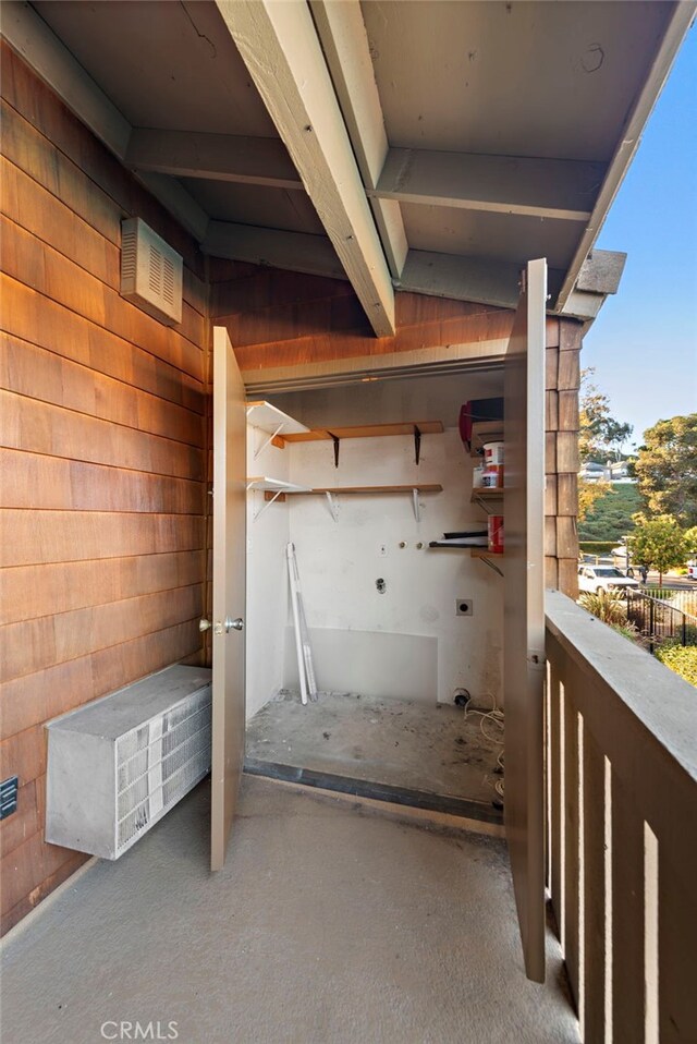 basement with wooden walls