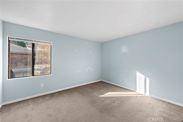 view of carpeted spare room