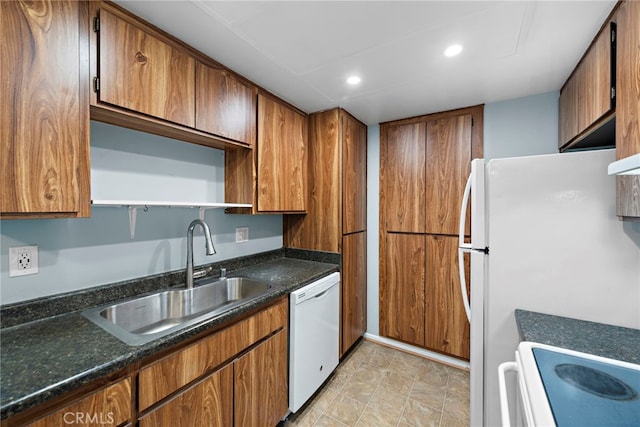 kitchen with white appliances and sink