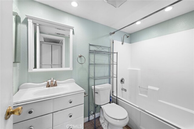 full bathroom with toilet, vanity, and bathing tub / shower combination