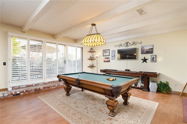 playroom featuring plenty of natural light, light hardwood / wood-style floors, and pool table