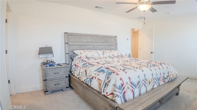 bedroom featuring light carpet and ceiling fan