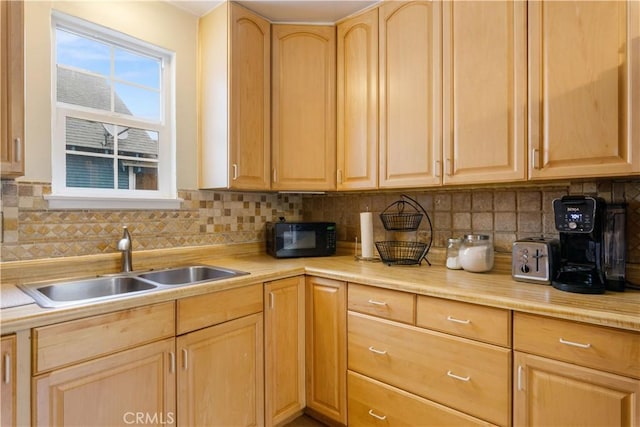 9528 Washington St, Upper Lake, CA 95485 - kitchen featuring light brown cabinets, black microwave, and a sink
