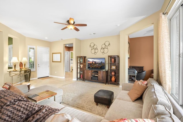 living room featuring ceiling fan