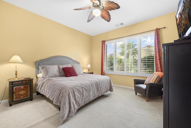 bedroom featuring ceiling fan and carpet floors