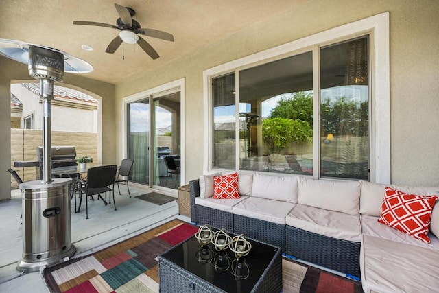 sunroom / solarium with ceiling fan