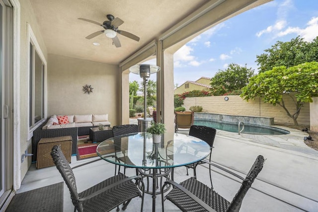 view of patio featuring an outdoor living space and ceiling fan