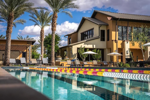 view of pool featuring a patio