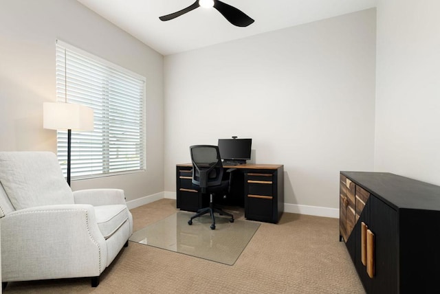 carpeted office with ceiling fan