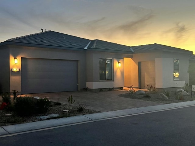 view of front of property featuring a garage