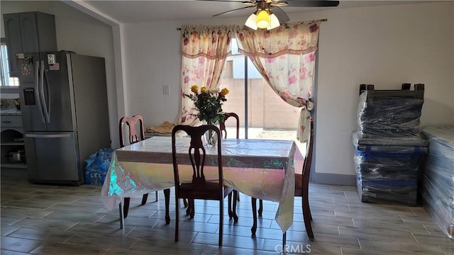 dining room featuring ceiling fan