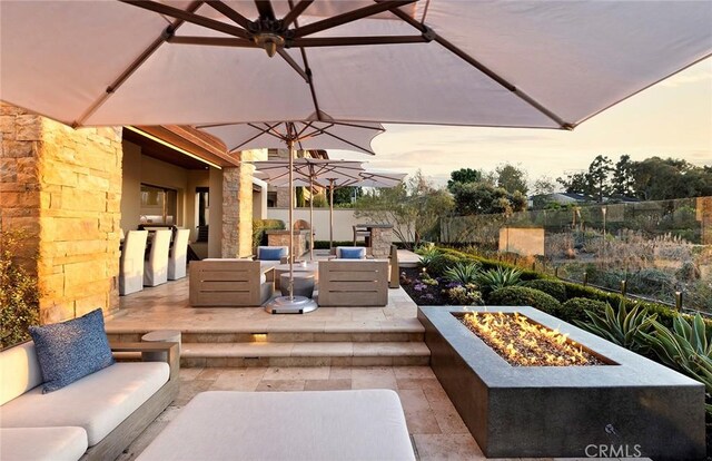 51 Monarch Beach Resort S, Dana Point, CA 92629 - view of patio / terrace featuring an outdoor living space with a fire pit