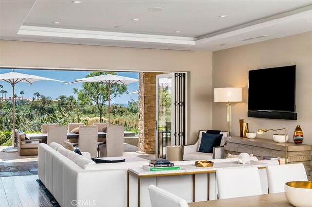51 Monarch Beach Resort S, Dana Point, CA 92629 - living area with a raised ceiling, wood finished floors, healthy amount of natural light, and recessed lighting