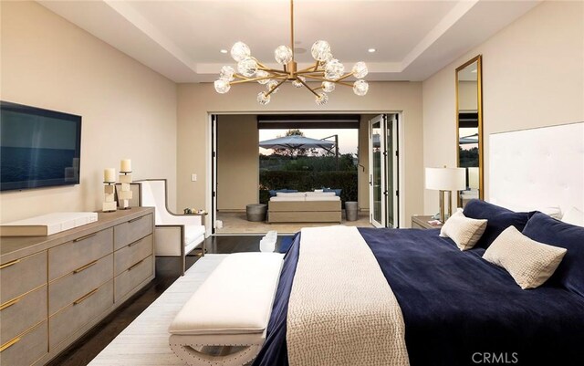 51 Monarch Beach Resort S, Dana Point, CA 92629 - bedroom featuring access to outside, a chandelier, and a tray ceiling