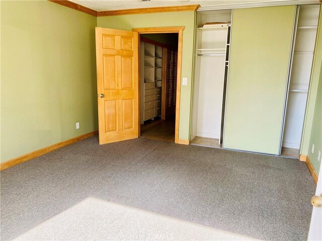 unfurnished bedroom featuring carpet and ornamental molding