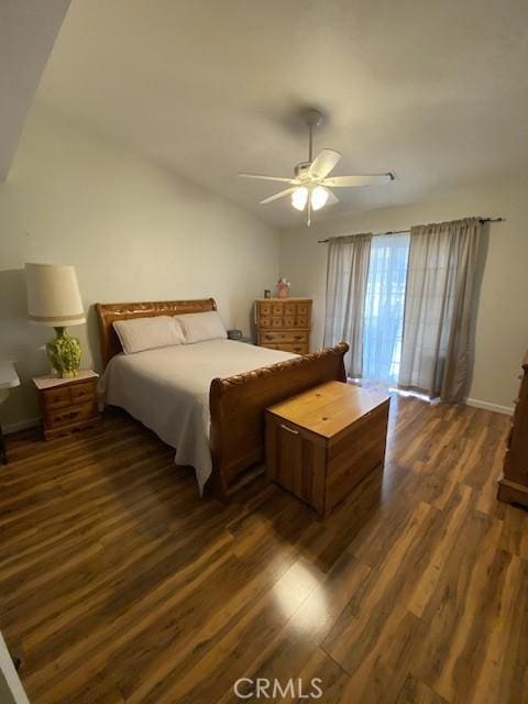 bedroom featuring ceiling fan and dark wood-type flooring