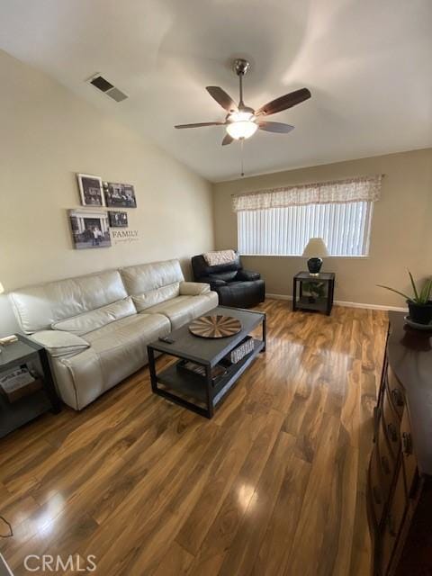 living room with ceiling fan, lofted ceiling, and wood-type flooring